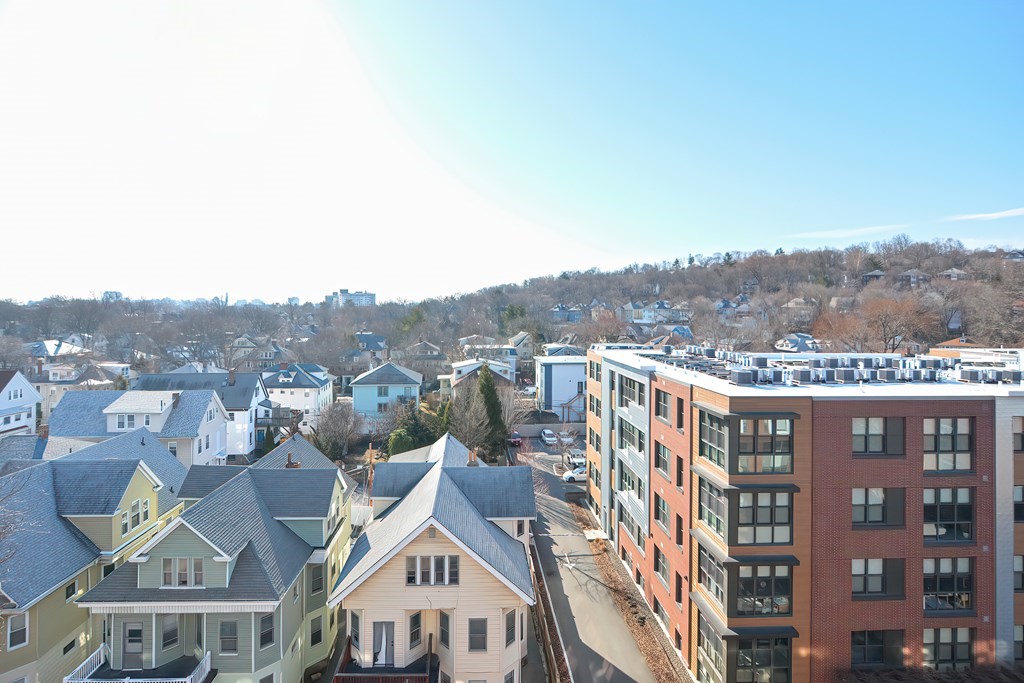 59 Brainerd Road, Unit 406 Boston, MA 02134 - Photo 8 of 19 a view of a city with tall buildings