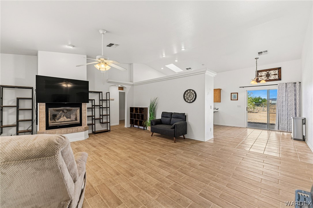9332 Branded Road Kingman, AZ 86401 - Photo 4 of 44 a view of a livingroom with furniture and a flat screen tv