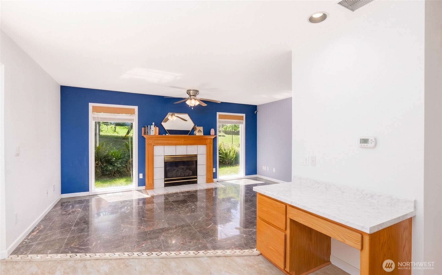 301 Mt Pleasant Estates Road Port Angeles, WA 98362 - Photo 11 of 40 a view of an empty room with window and fire place