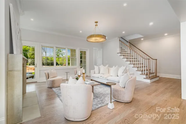 a living room with furniture and a table