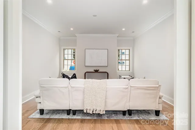 a living room with granite countertop furniture and window