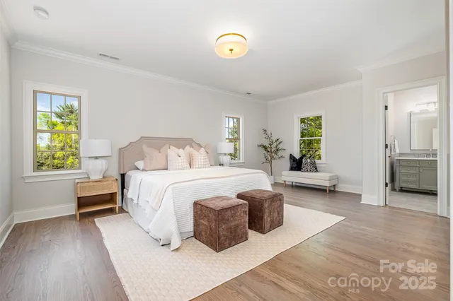 a bedroom with a bed and a outer view