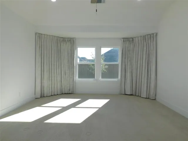 a bathroom with a shower sink and mirror