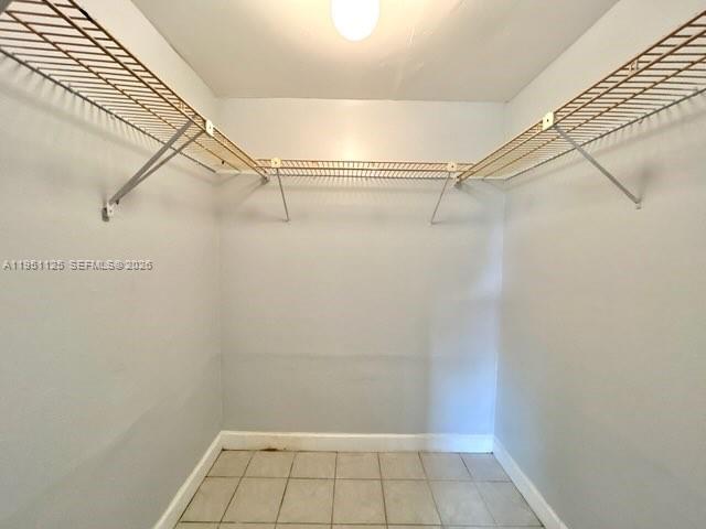 8020 North Colony Circle, Unit 203 Tamarac, FL 33321 - Photo 12 of 13 a view of a room with racks on the wall