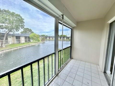 8020 North Colony Circle, Unit 203 Tamarac, FL 33321 - Photo 9 of 13 a view of an entryway