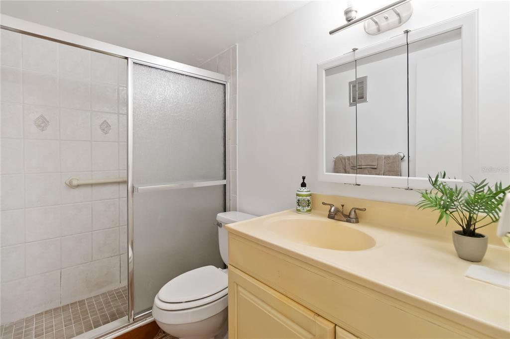 525 South Conway Road, Unit 29 Orlando, FL 32807 - Photo 22 of 29 a bathroom with a sink toilet and shower