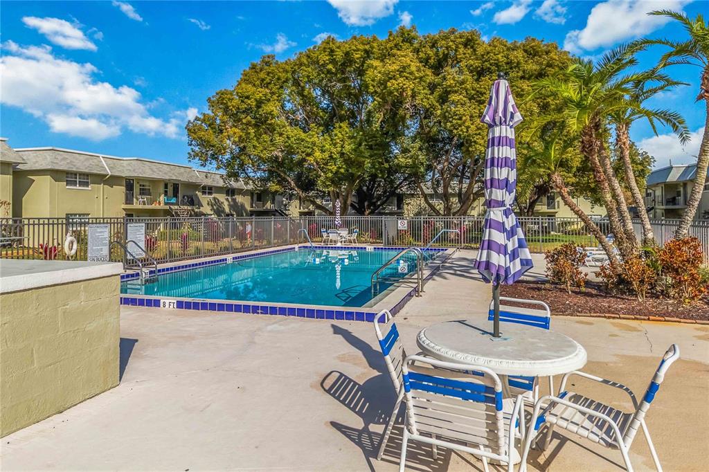 525 South Conway Road, Unit 29 Orlando, FL 32807 - Photo 26 of 29 a view of an outdoor space with seating