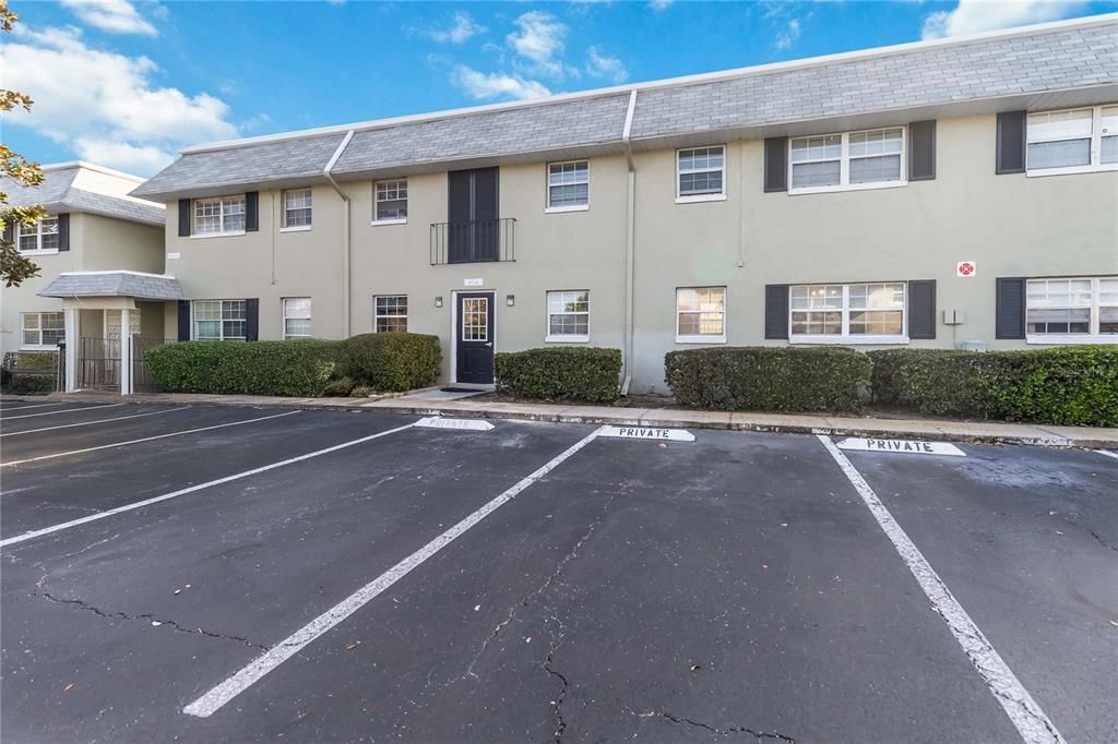 525 South Conway Road, Unit 29 Orlando, FL 32807 - Photo 4 of 29 a front view of a house with a yard