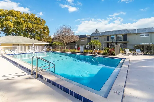 a view of a chairs and table on the terrace