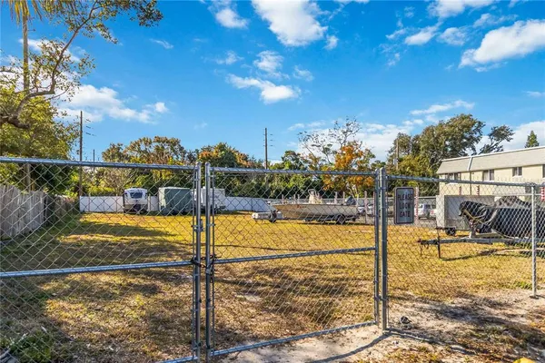 a view of a swimming pool with a chair