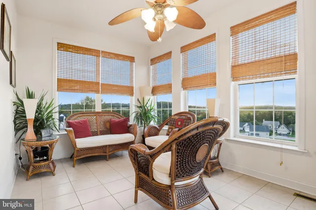 a kitchen with stainless steel appliances granite countertop a sink stove and microwave