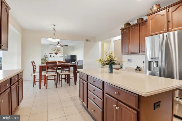 a bathroom with a sink toilet double vanity and shower