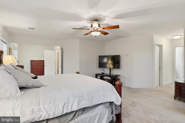 a view of a chairs on the roof deck