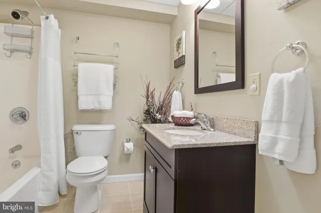 an aerial view of a pool patio swimming pool and mountain view
