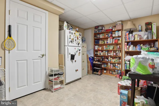 a view of a playground with basketball court