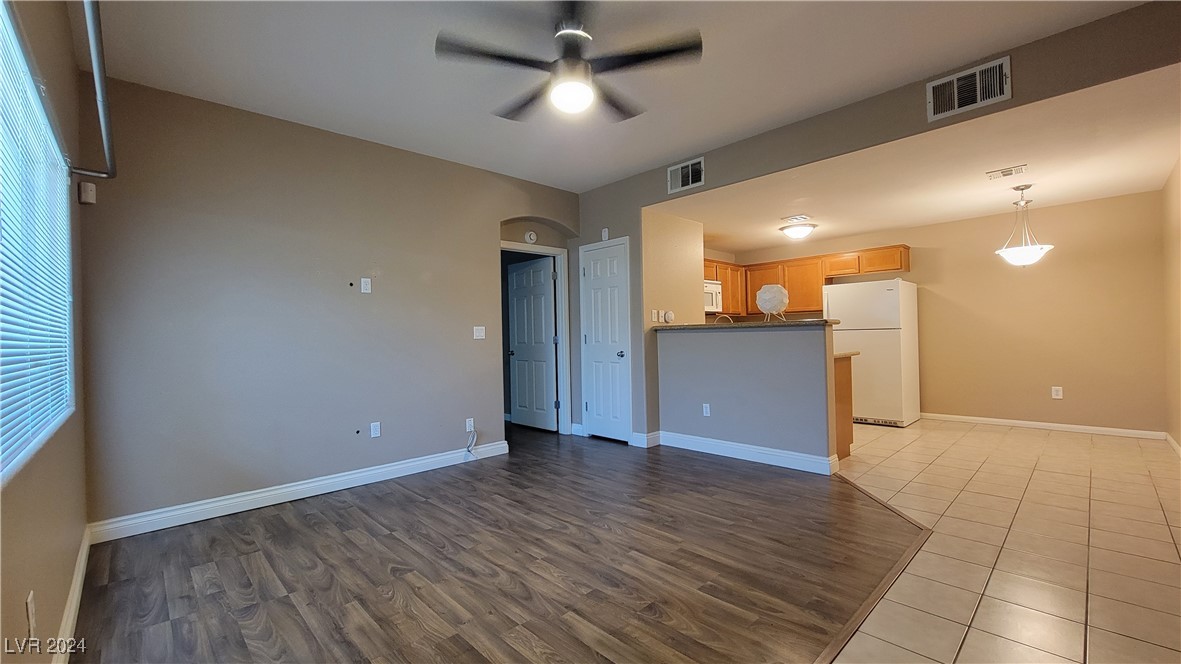 7701 West Robindale Road, Unit 169 Las Vegas, NV 89113 - Photo 2 of 16 Living & Kitchen