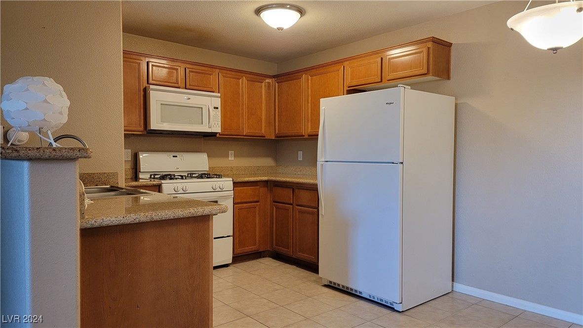 7701 West Robindale Road, Unit 169 Las Vegas, NV 89113 - Photo 3 of 16 Kitchen