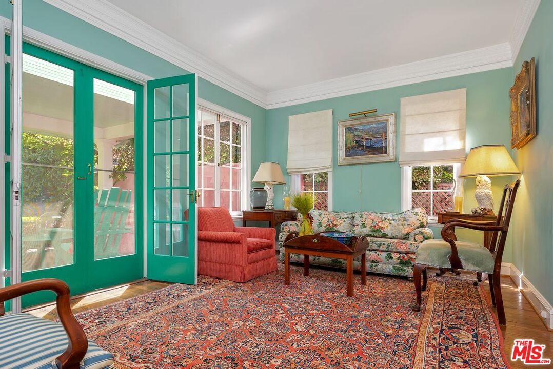 208 South Plymouth Boulevard Los Angeles, CA 90004 - Photo 13 of 44 a bedroom with furniture and a window