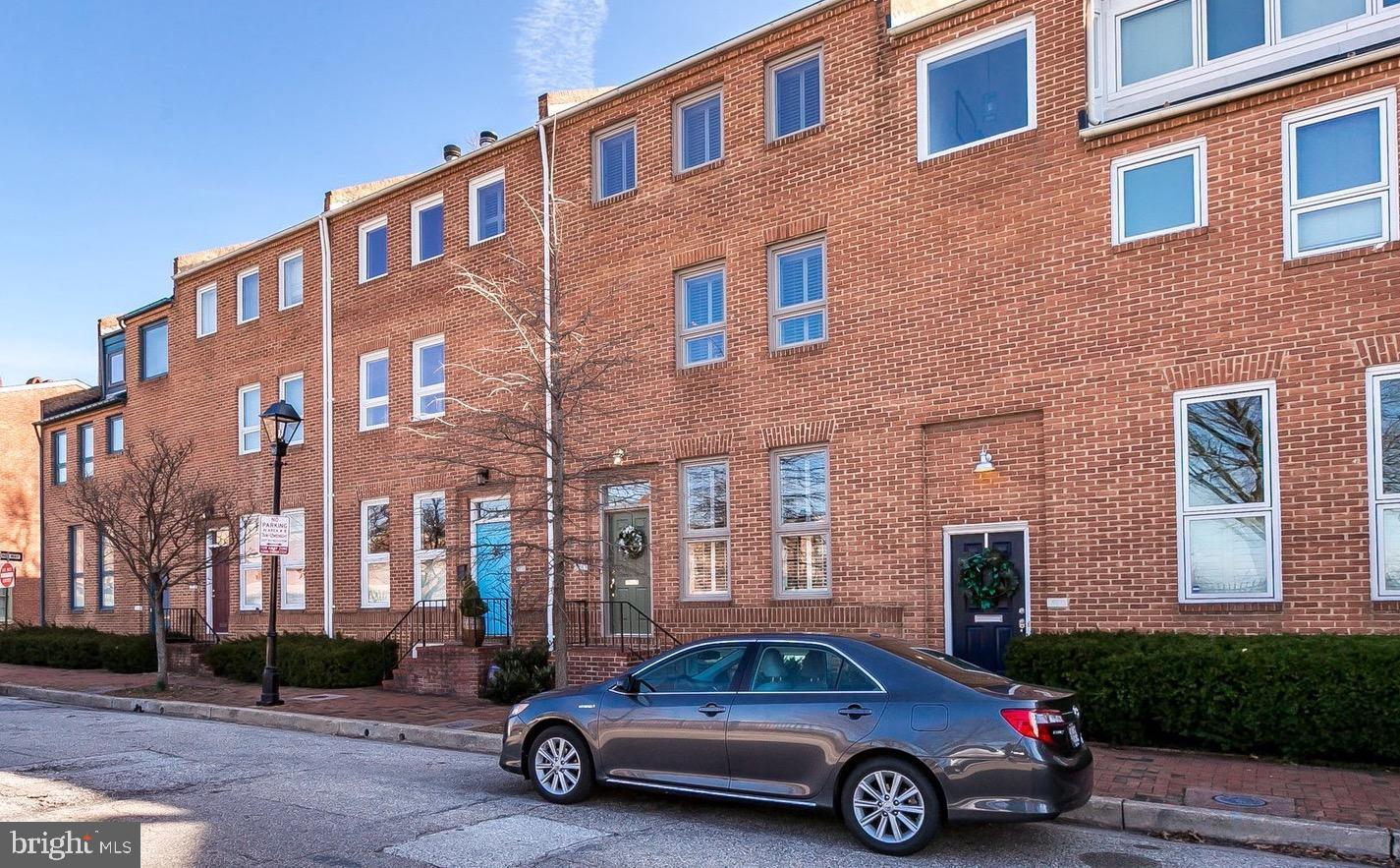 619 South Sharp Street Baltimore, MD 21230 - Photo 50 of 51 a car parked in front of a brick building