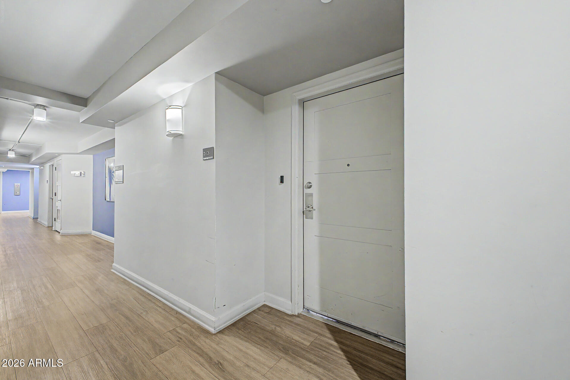 535 West Thomas Road, Unit 513 Phoenix, AZ 85013 - Photo 1 of 33 a view of entryway with wooden floor