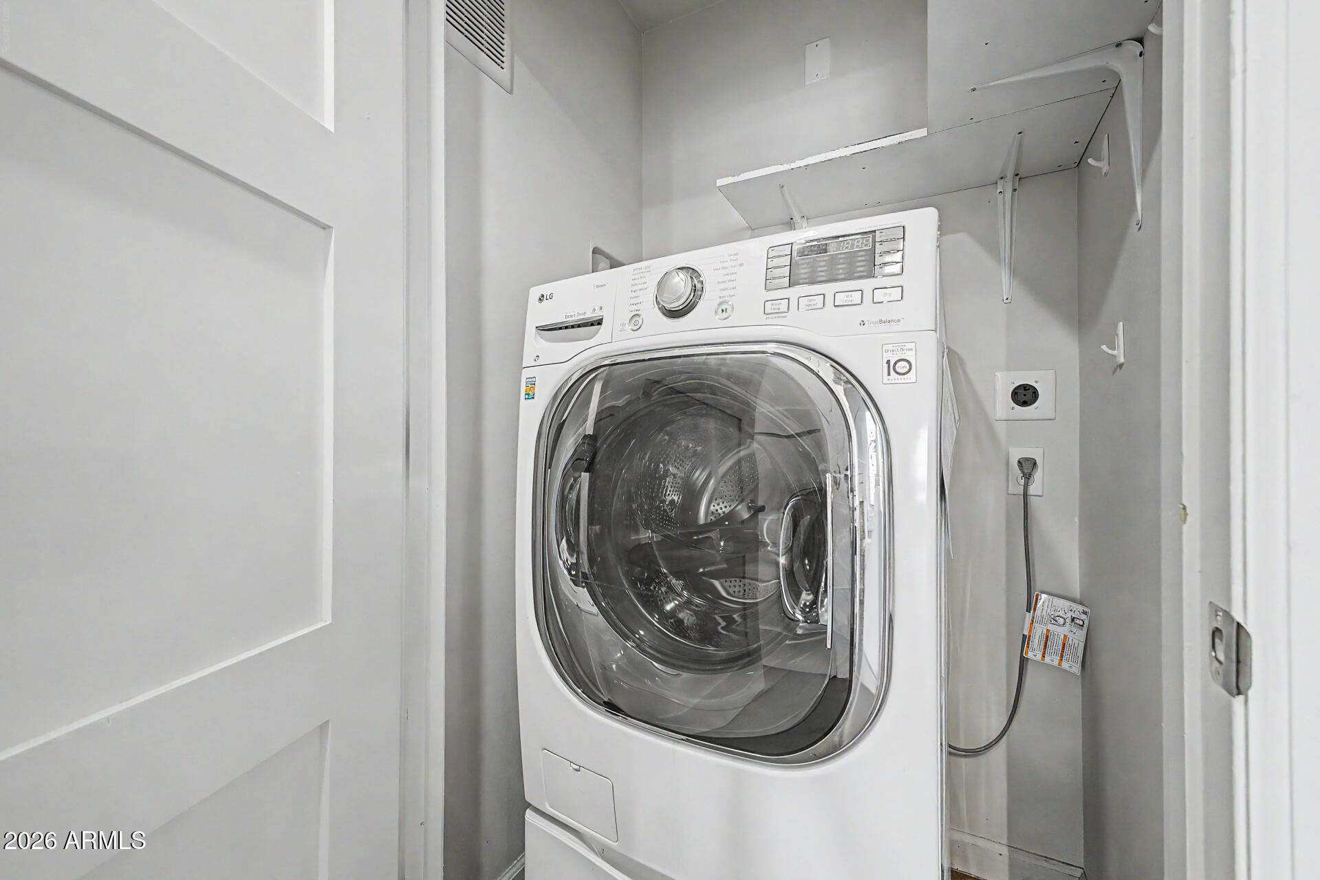 535 West Thomas Road, Unit 513 Phoenix, AZ 85013 - Photo 26 of 33 a utility room with dryer and washer