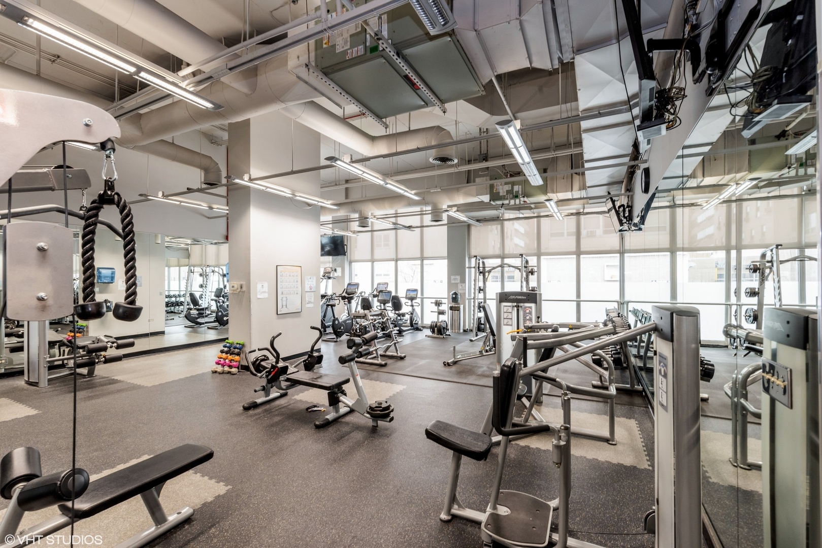 655 West Irving Park Road, Unit 1912 Chicago, IL 60613 - Photo 23 of 29 a view of a room with gym equipment