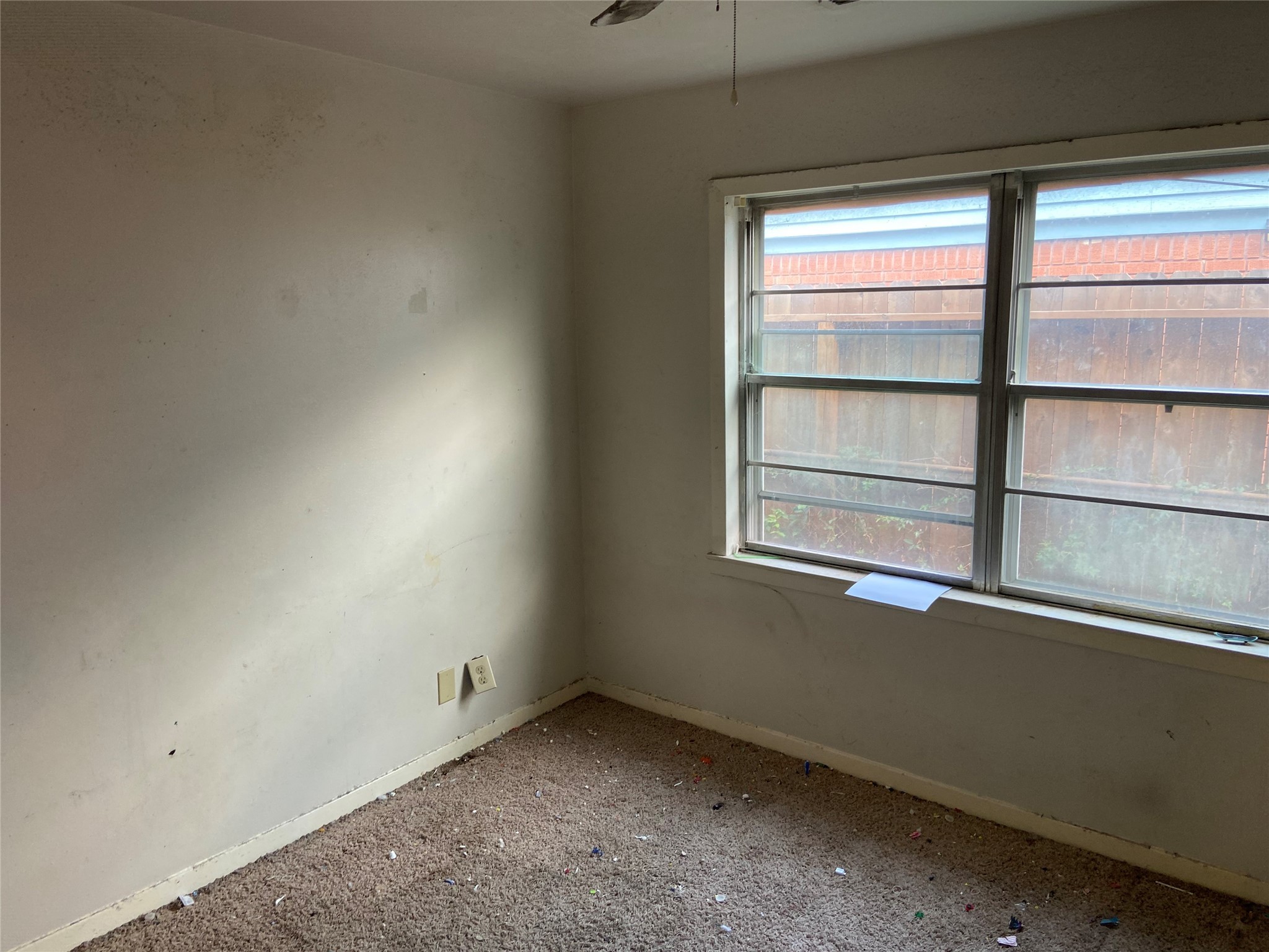 8730 Cowart Street Houston, TX 77029 - Photo 17 of 25 a view of an empty room with a window