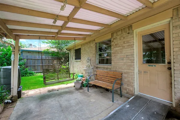a view of sitting area in front of a house