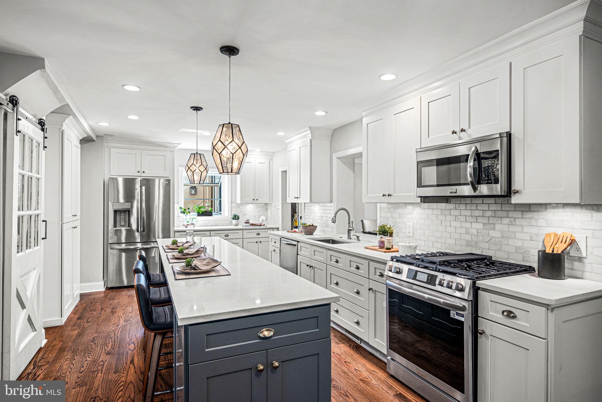 79 Crestline Road Wayne, PA 19087 - Photo 11 of 51 Kitchen with marble backsplash, quartz countertops