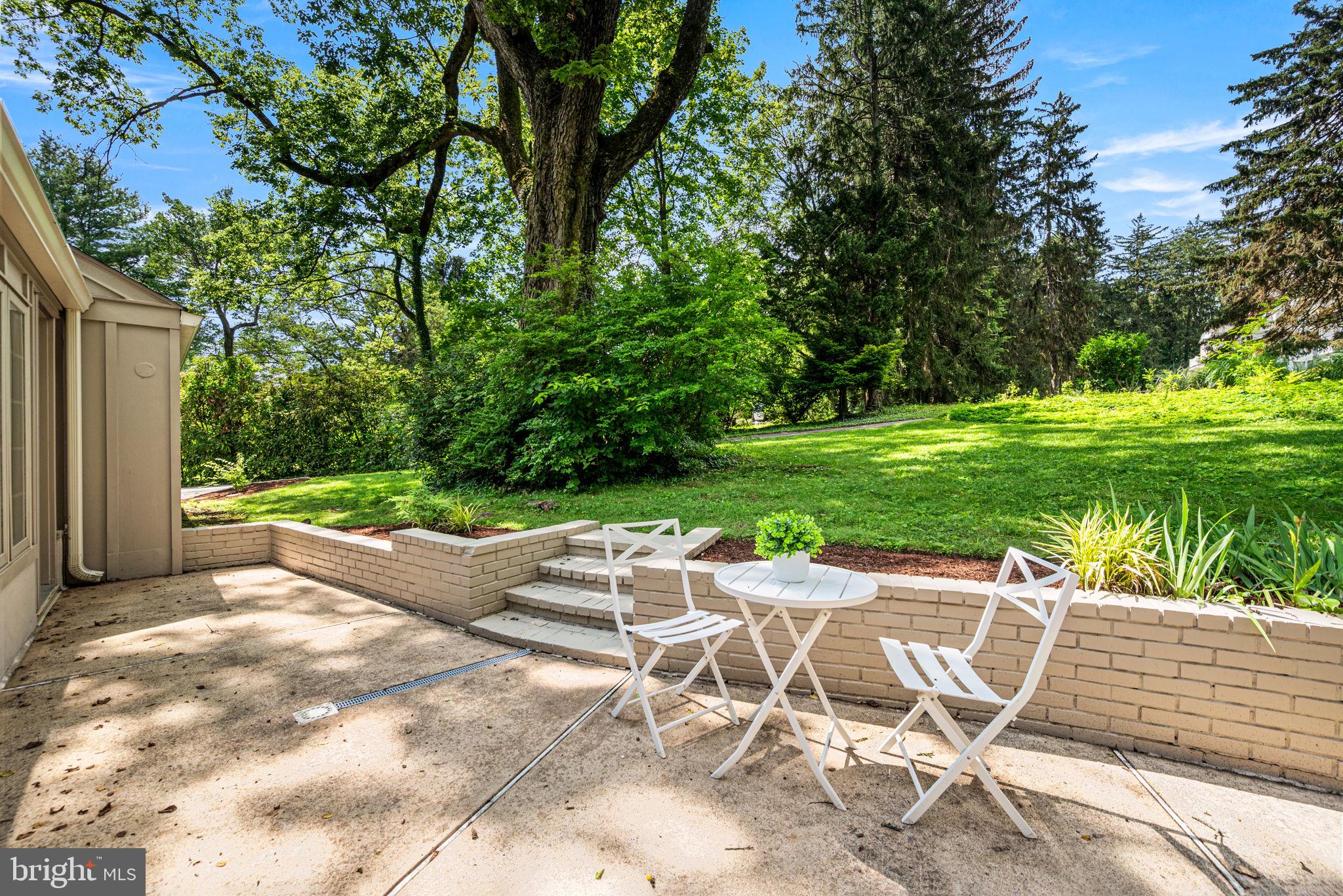 79 Crestline Road Wayne, PA 19087 - Photo 42 of 51 Back patio with steps to yard