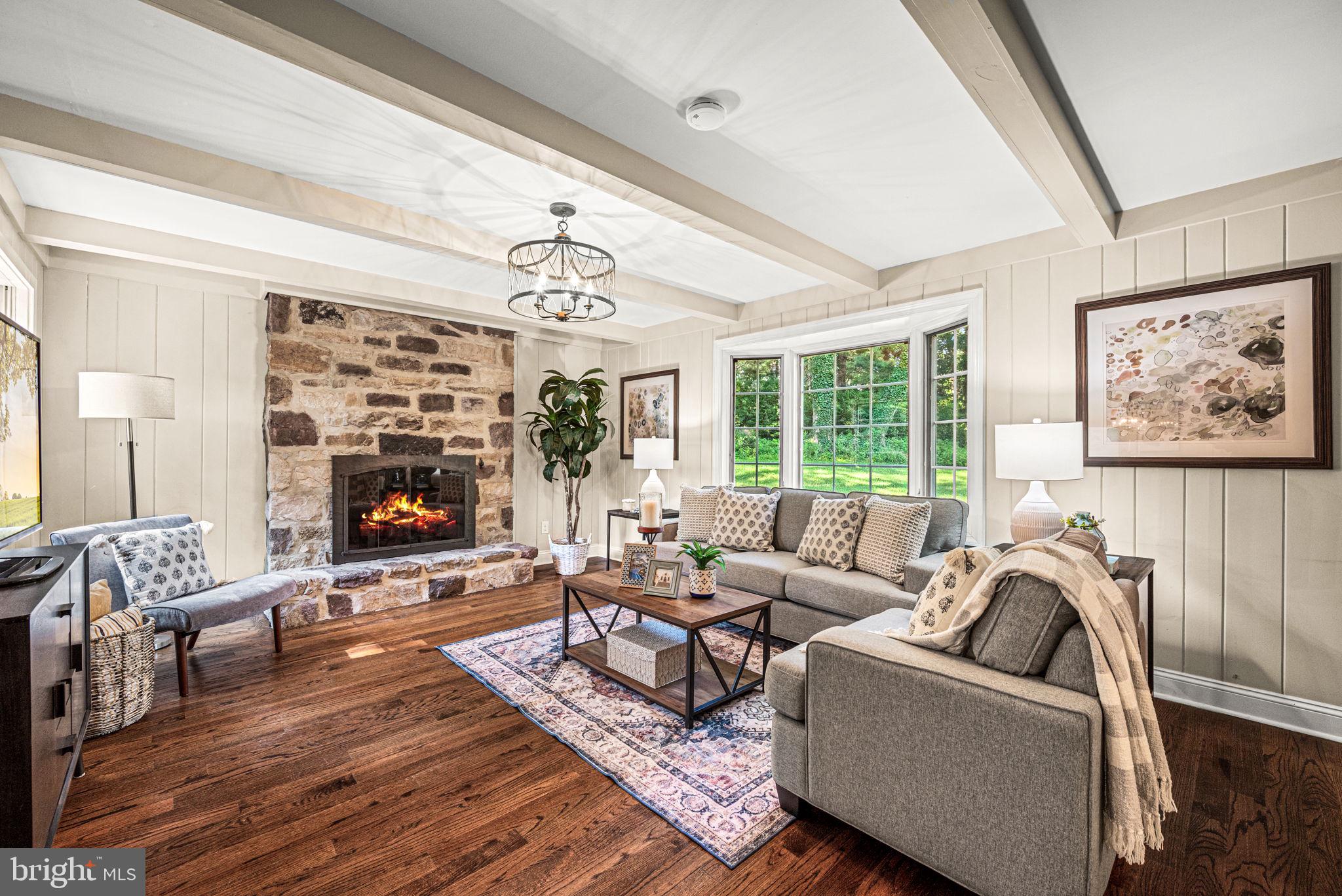 79 Crestline Road Wayne, PA 19087 - Photo 7 of 51 Family room - stone wood burning fireplace