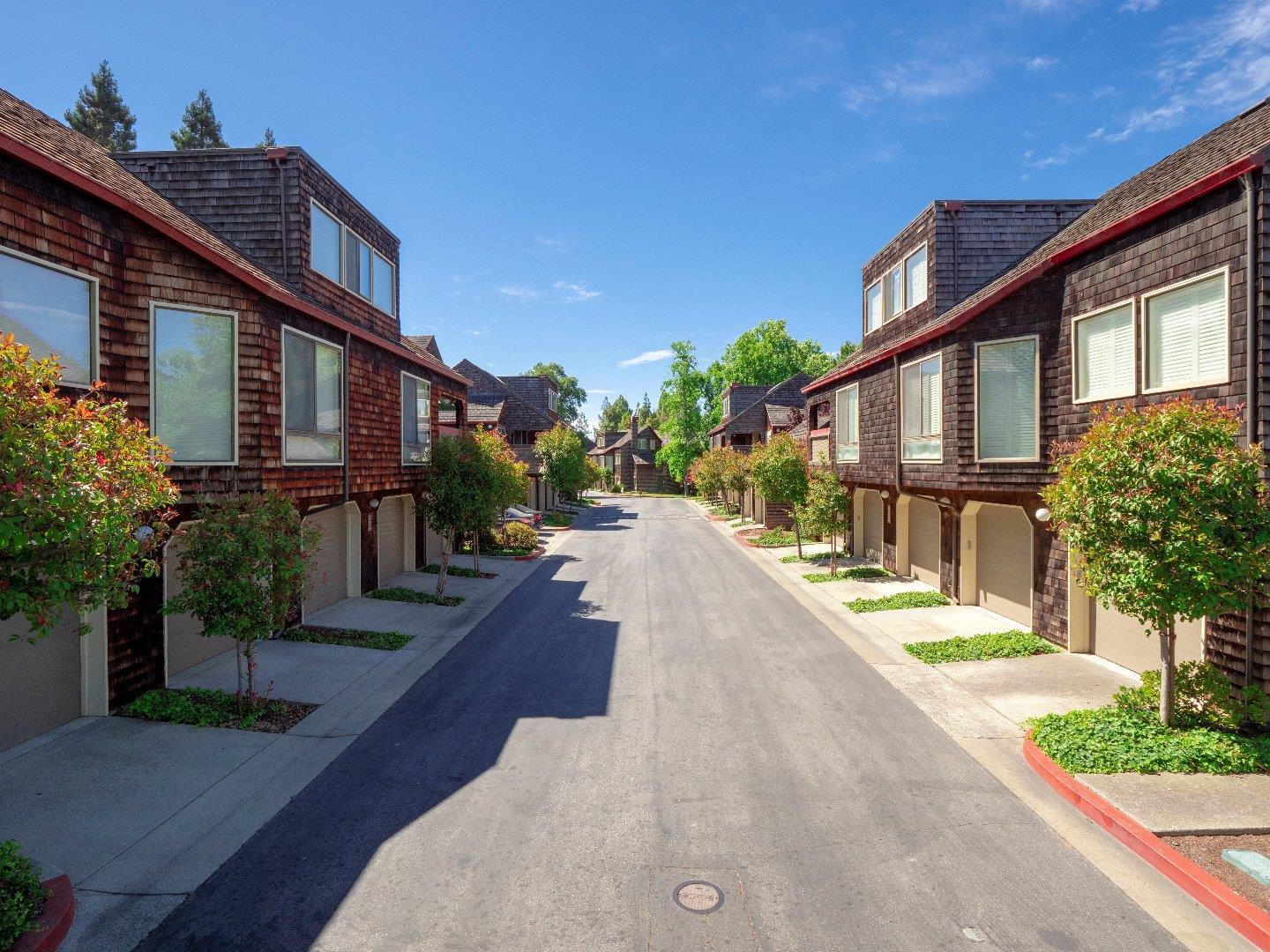 124 Peter Coutts Circle Stanford, CA 94305 - Photo 2 of 17 a view of a brick building next to a yard
