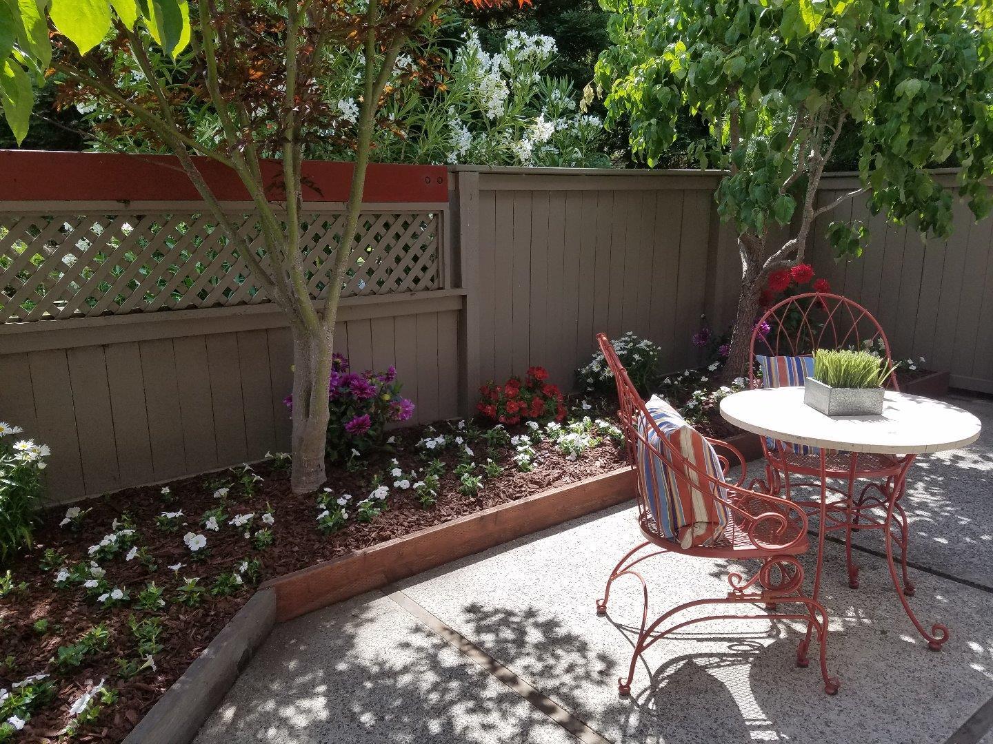 124 Peter Coutts Circle Stanford, CA 94305 - Photo 3 of 17 a view of a chairs and table in the patio