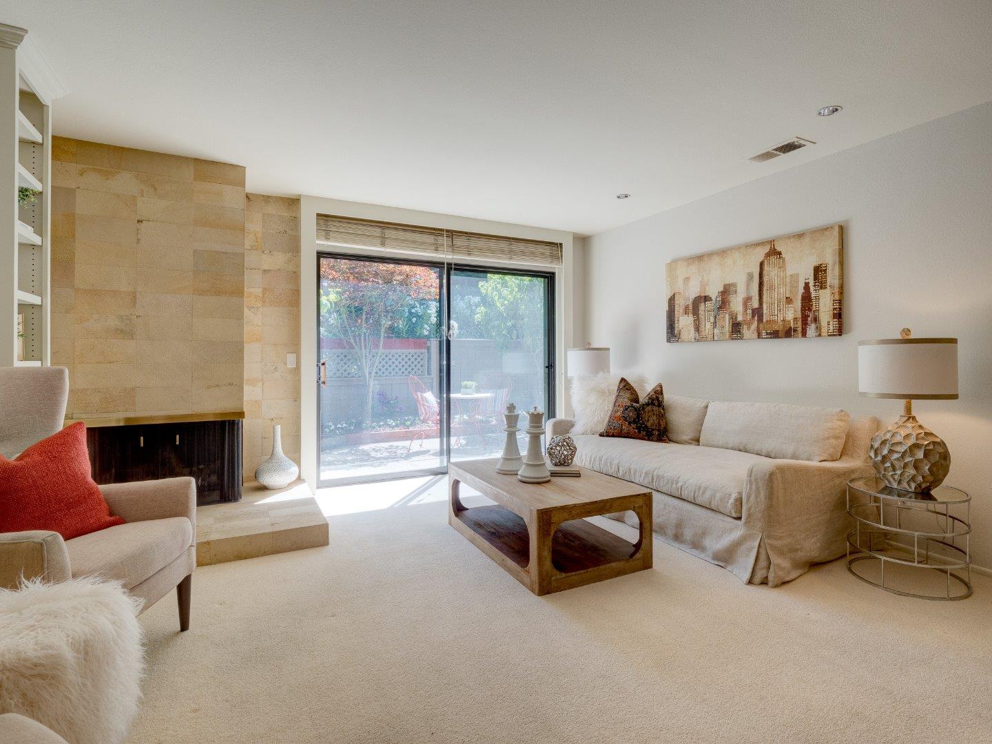 124 Peter Coutts Circle Stanford, CA 94305 - Photo 8 of 17 a living room with furniture and a large window