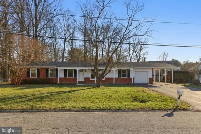 front view of a house with a big yard