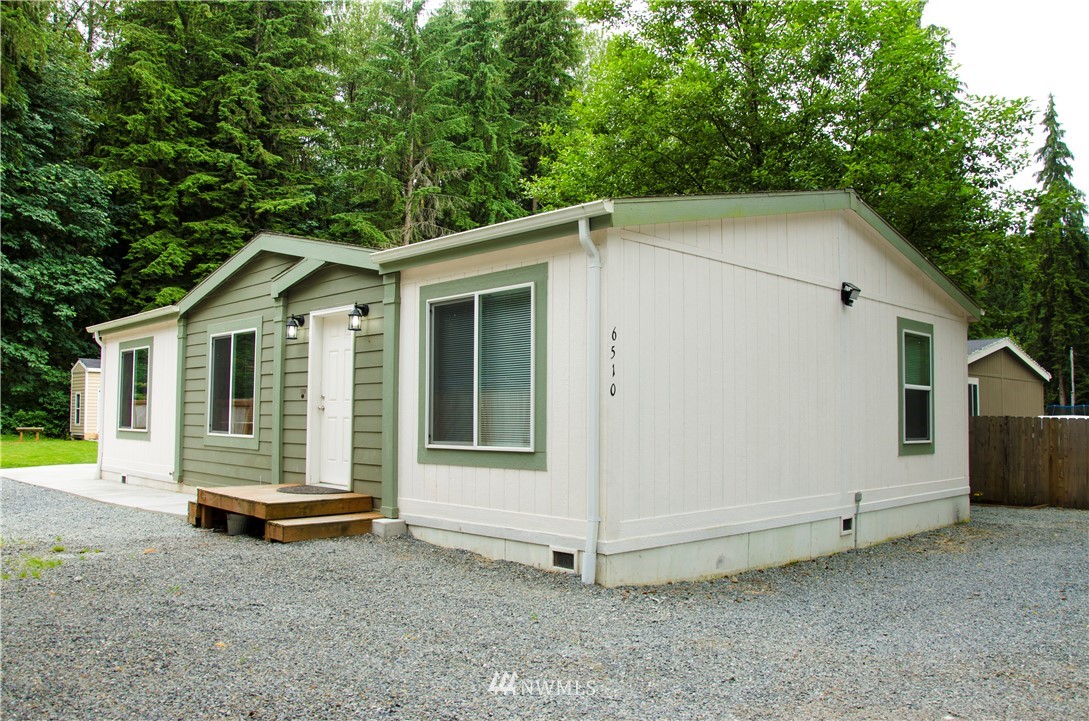6510 Skinner Road Granite Falls, WA 98252 - Photo 1 of 19 a view of a house with a yard