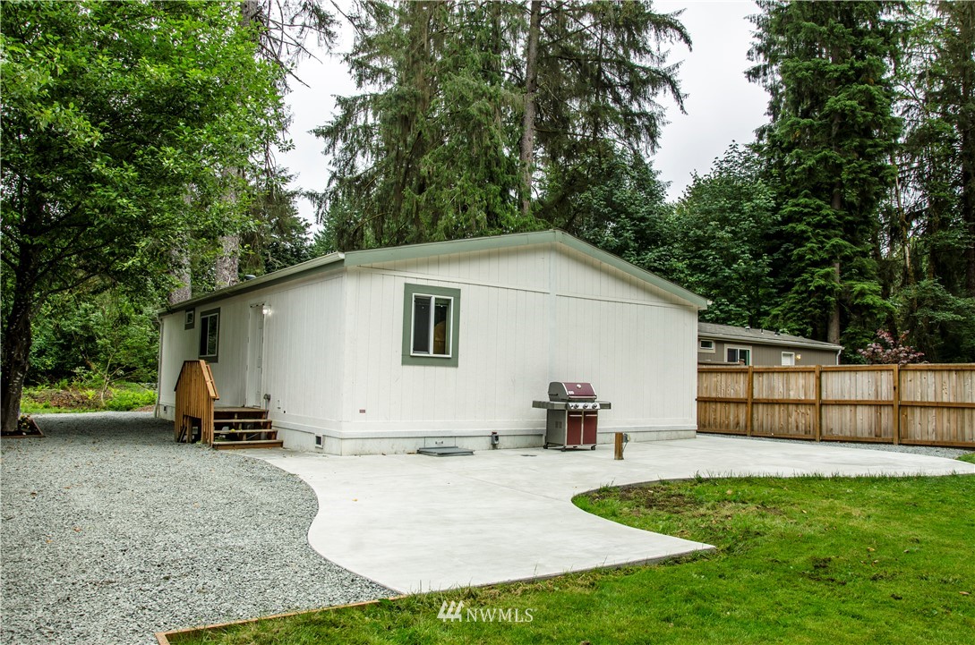 6510 Skinner Road Granite Falls, WA 98252 - Photo 3 of 19 a view of backyard with sitting area