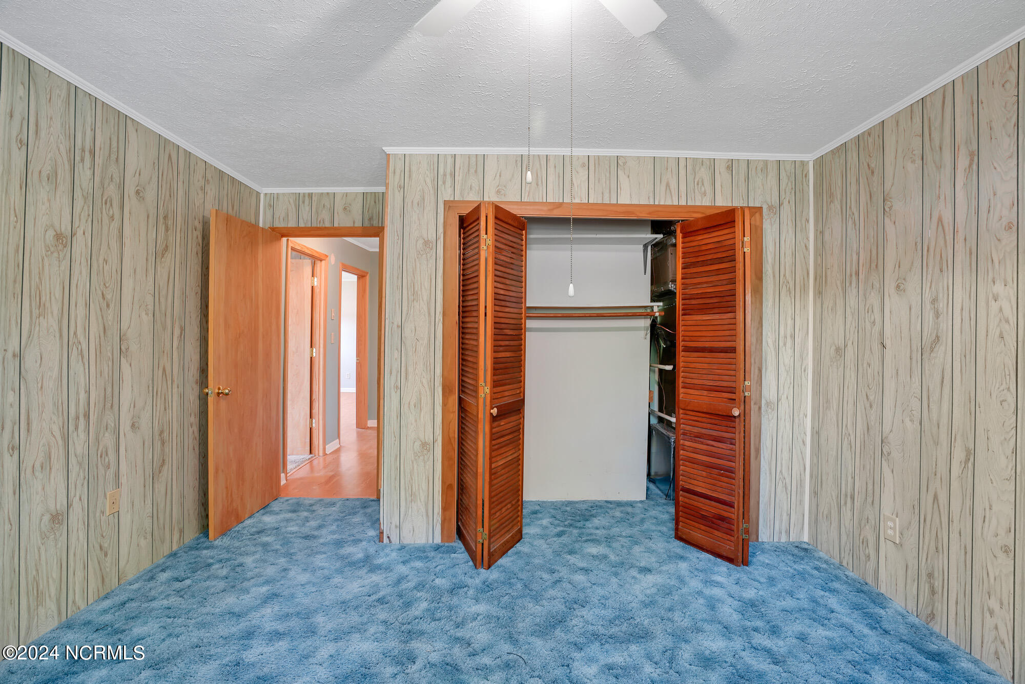 83 Maco Road Northeast Leland, NC 28451 - Photo 19 of 39 Closet also has the air handler with air purifier attached.