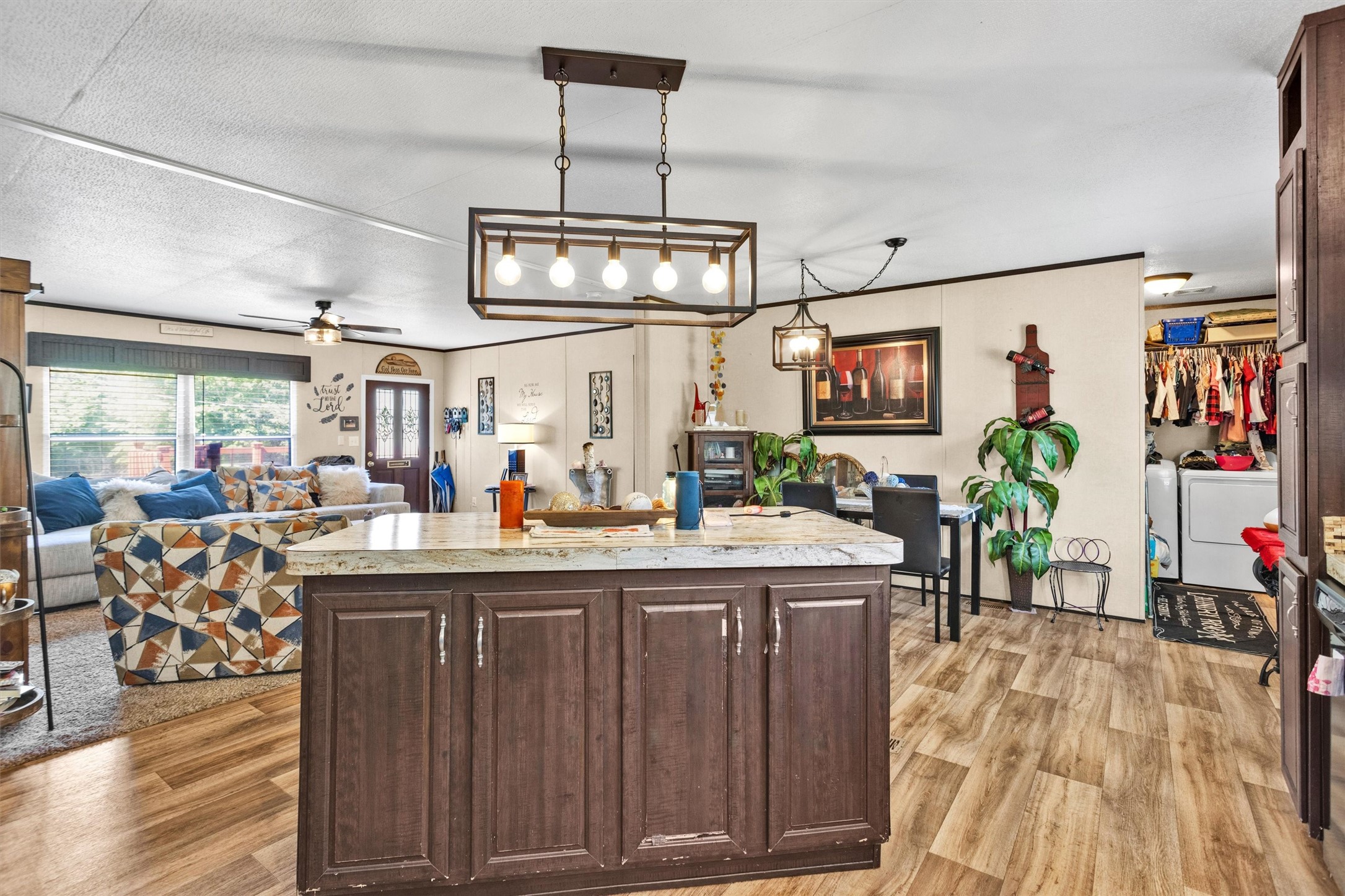 56 Michael Street Huntsville, TX 77320 - Photo 16 of 37 a kitchen with stainless steel appliances granite countertop a stove and cabinets