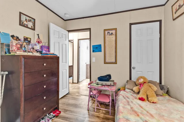 a room with a workspace and a couch