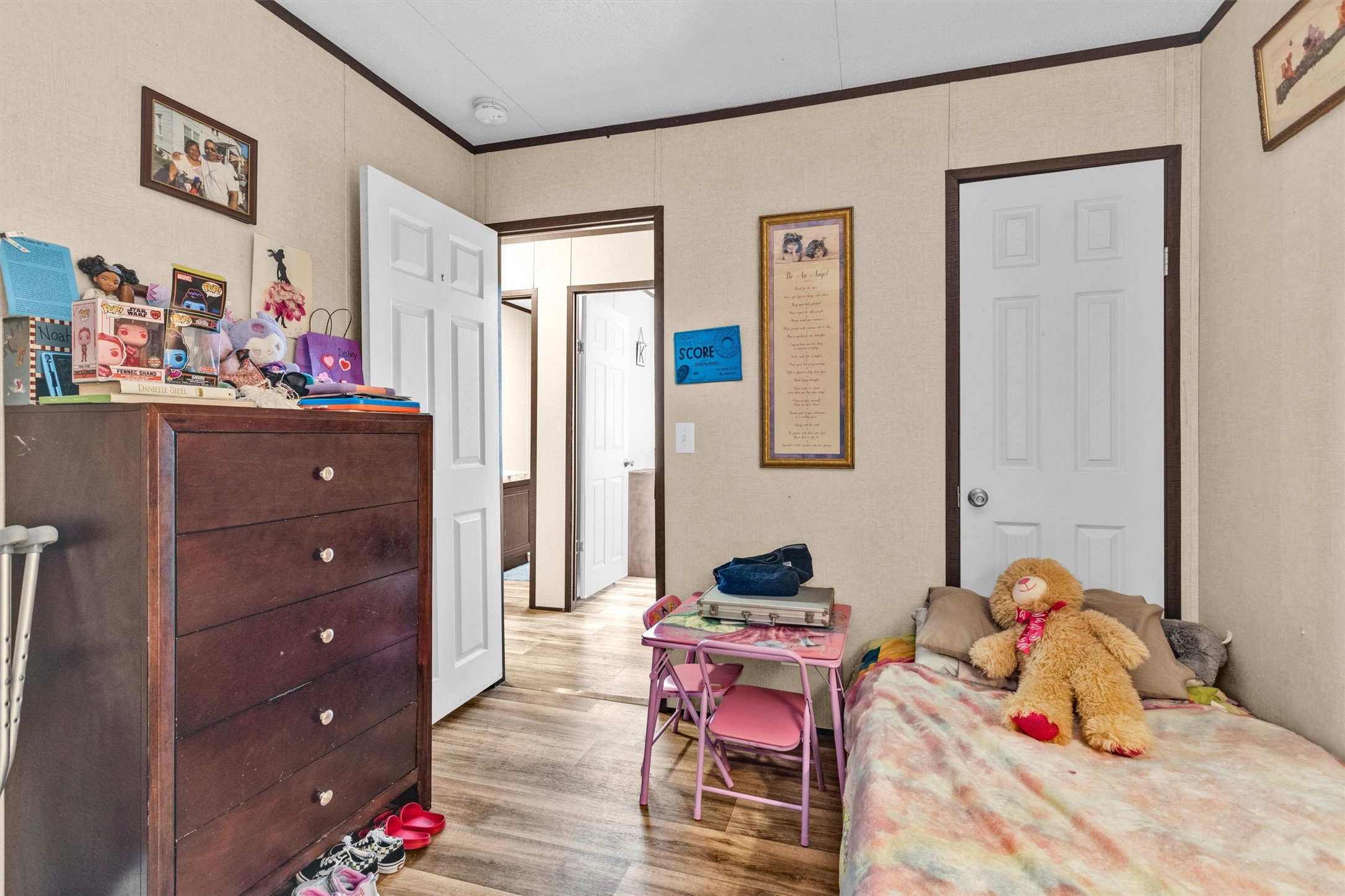 56 Michael Street Huntsville, TX 77320 - Photo 30 of 37 a room with a workspace and a couch