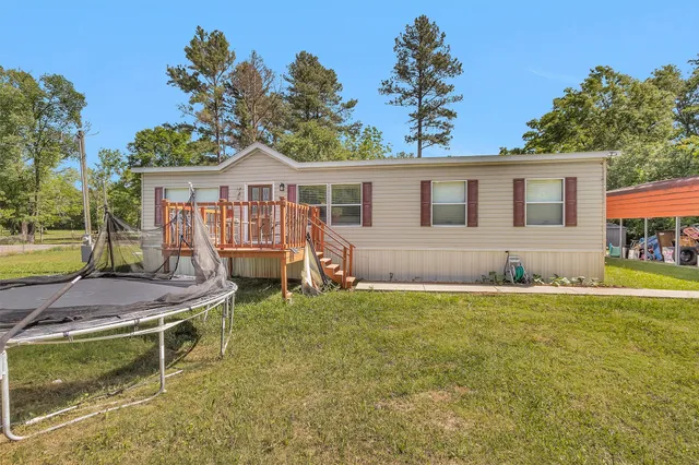 a house view with a garden space