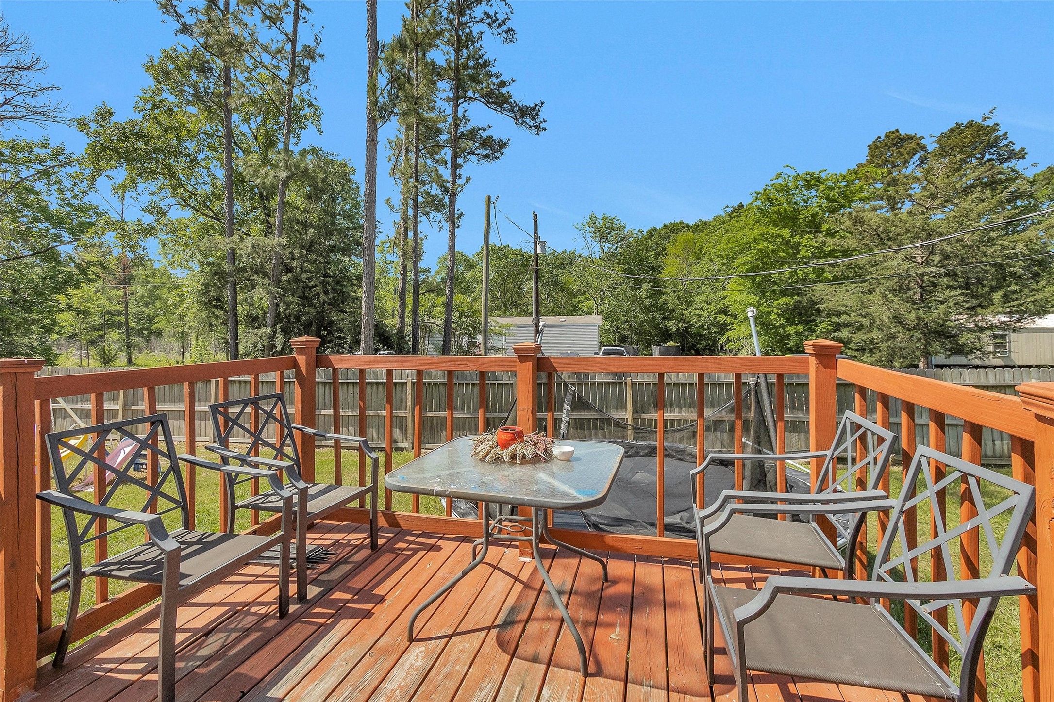 56 Michael Street Huntsville, TX 77320 - Photo 6 of 37 a view of a chairs on the roof deck