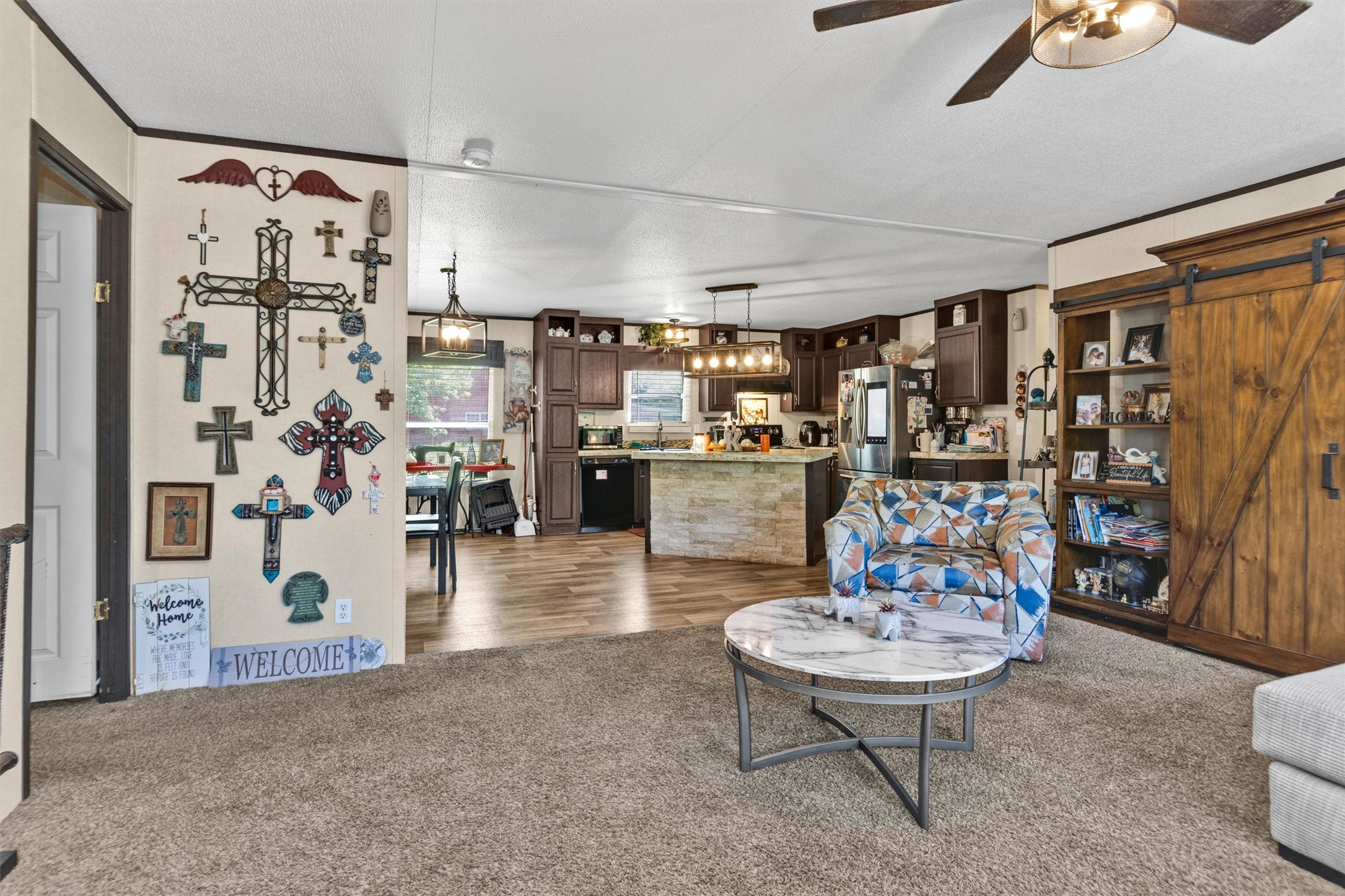 56 Michael Street Huntsville, TX 77320 - Photo 8 of 37 a living room with lots of furniture and white walls
