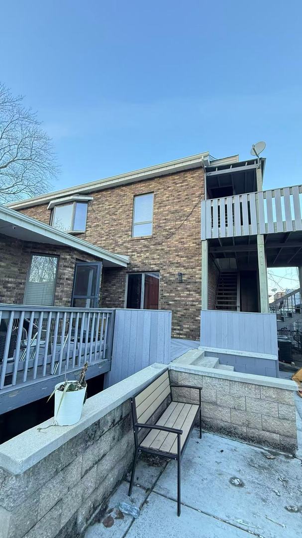 3017 South Canal Street Chicago, IL 60616 - Photo 5 of 6 a view of house with a deck