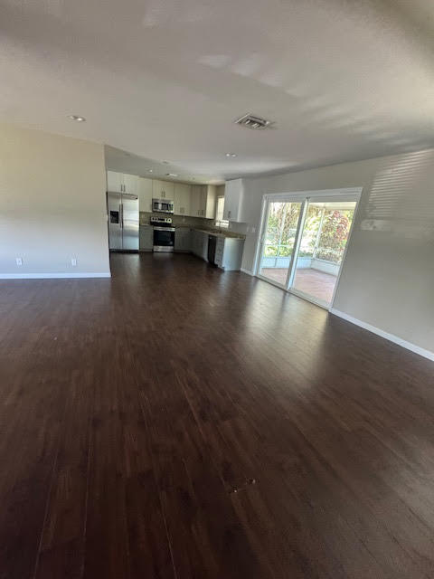 709 Southeast Alamanda Way Stuart, FL 34996 - Photo 7 of 17 Living Room- Dining Room