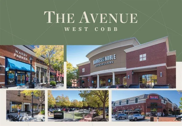 a front view of a building with parking