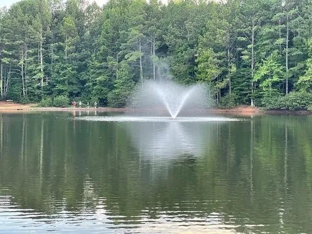 a view of a lake from a balcony