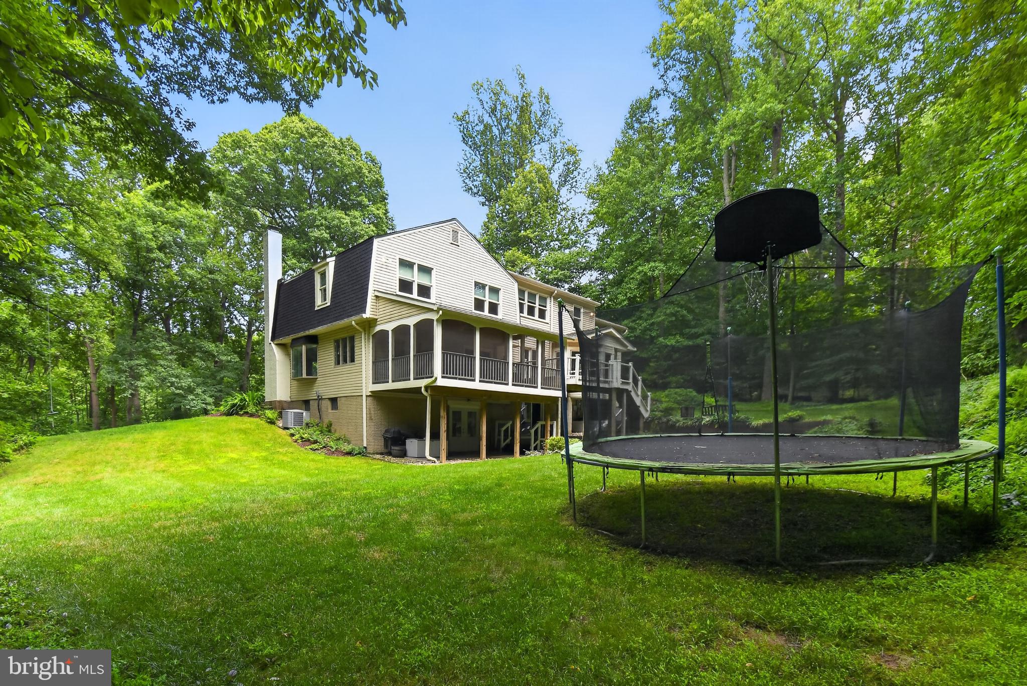 11728 Stuart Mill Road Oakton, VA 22124 - Photo 55 of 68 Serene backyard retreat with trampoline.