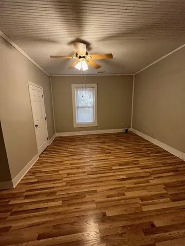 a view of an empty room and window